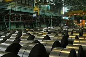 Black annealed cold rolled steel coils stored in industrial warehouse for metal manufacturing applications