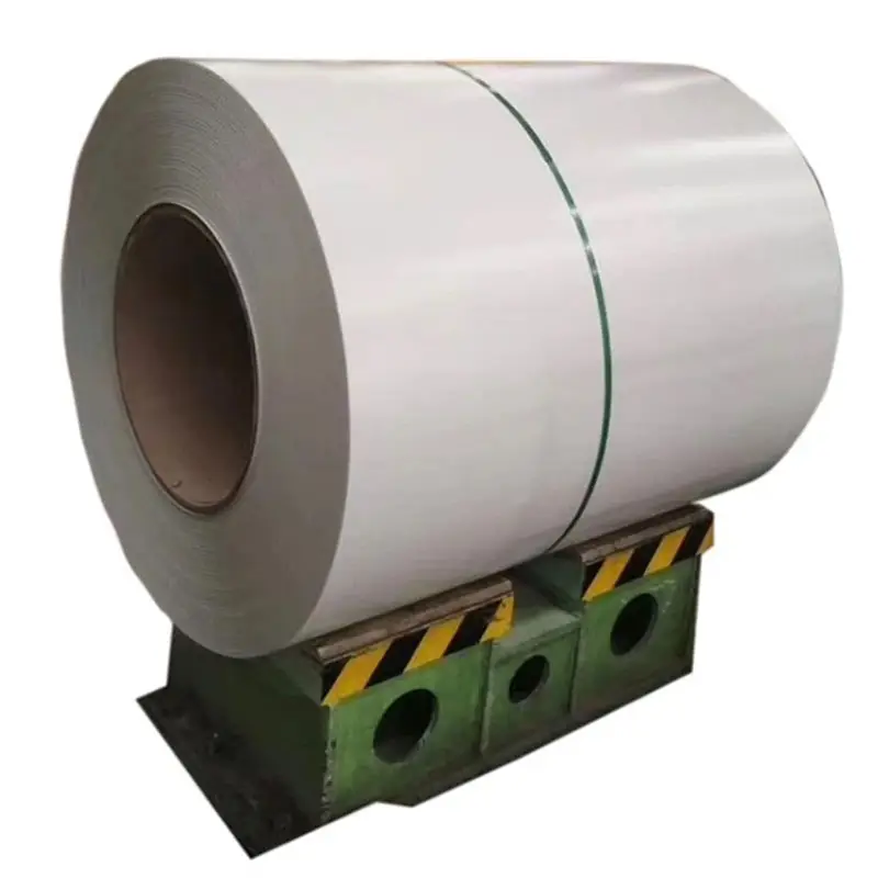 large steel coil with a smooth silver gray surface secured by a steel strap and supported on industrial storage stands